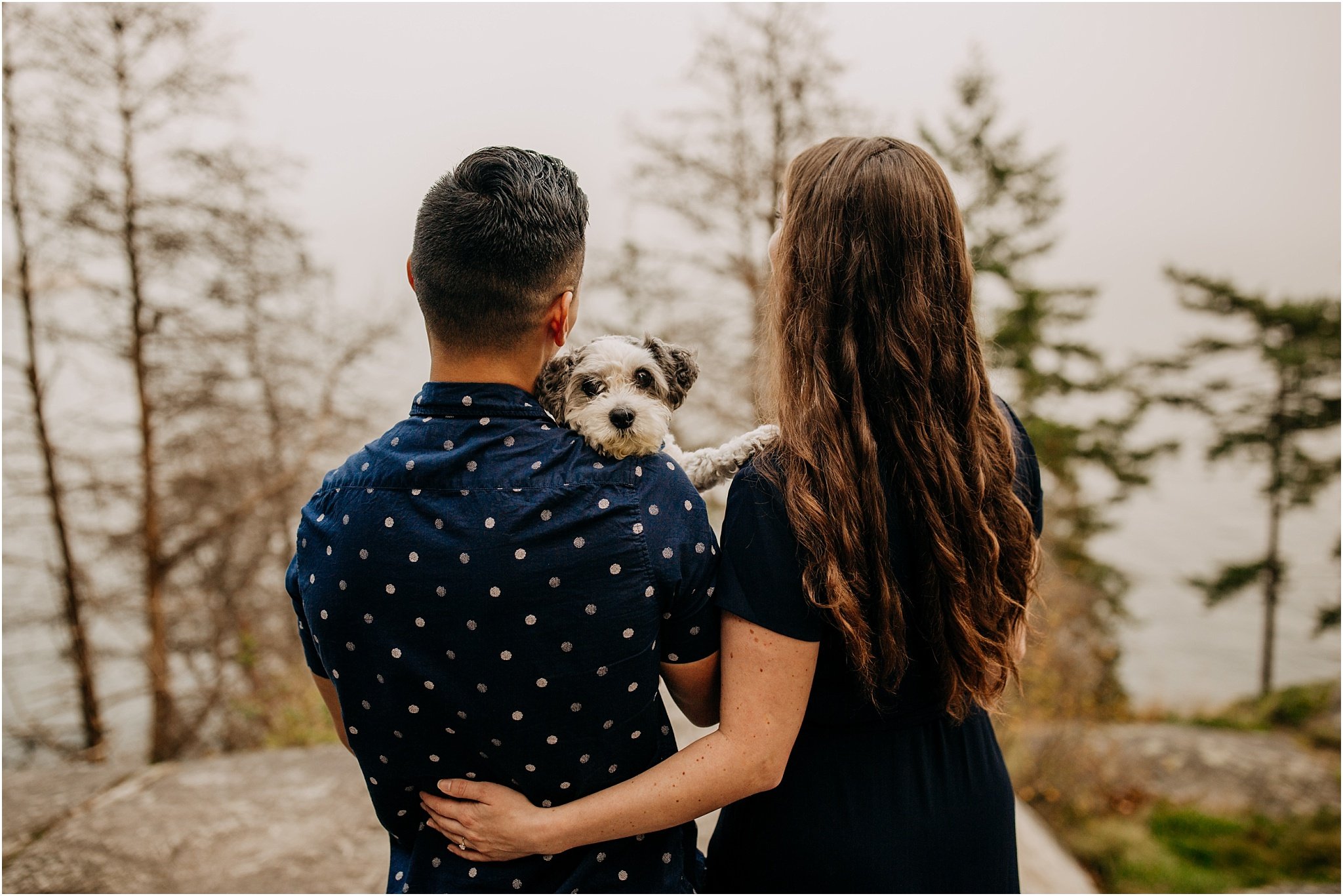 couples engagement session with puppy at lighthouse park west vancouver bc