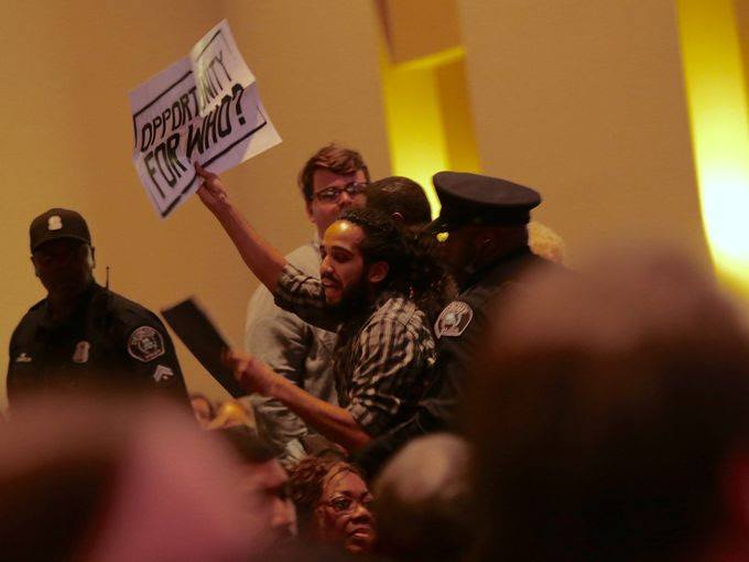 Antonio Cosme disrupting Mayor Duggan’s State of the City address. Photo Credit: Julia Cuneo