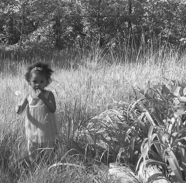 Mr. and Mrs. Turner’s great great granddaughter in a field on their block in 2017.
