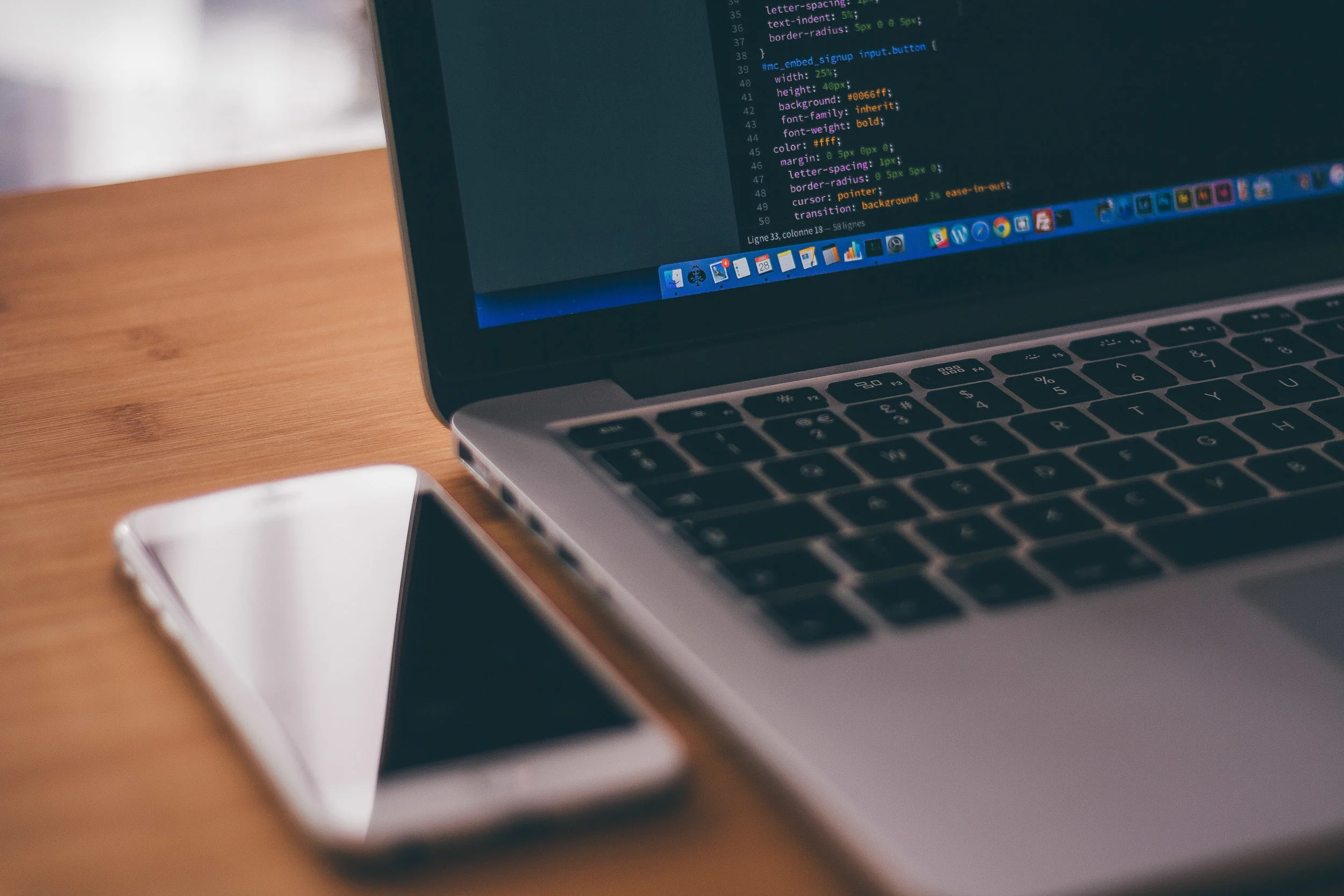 negative-space-glare-iphone-macbook-code.jpg