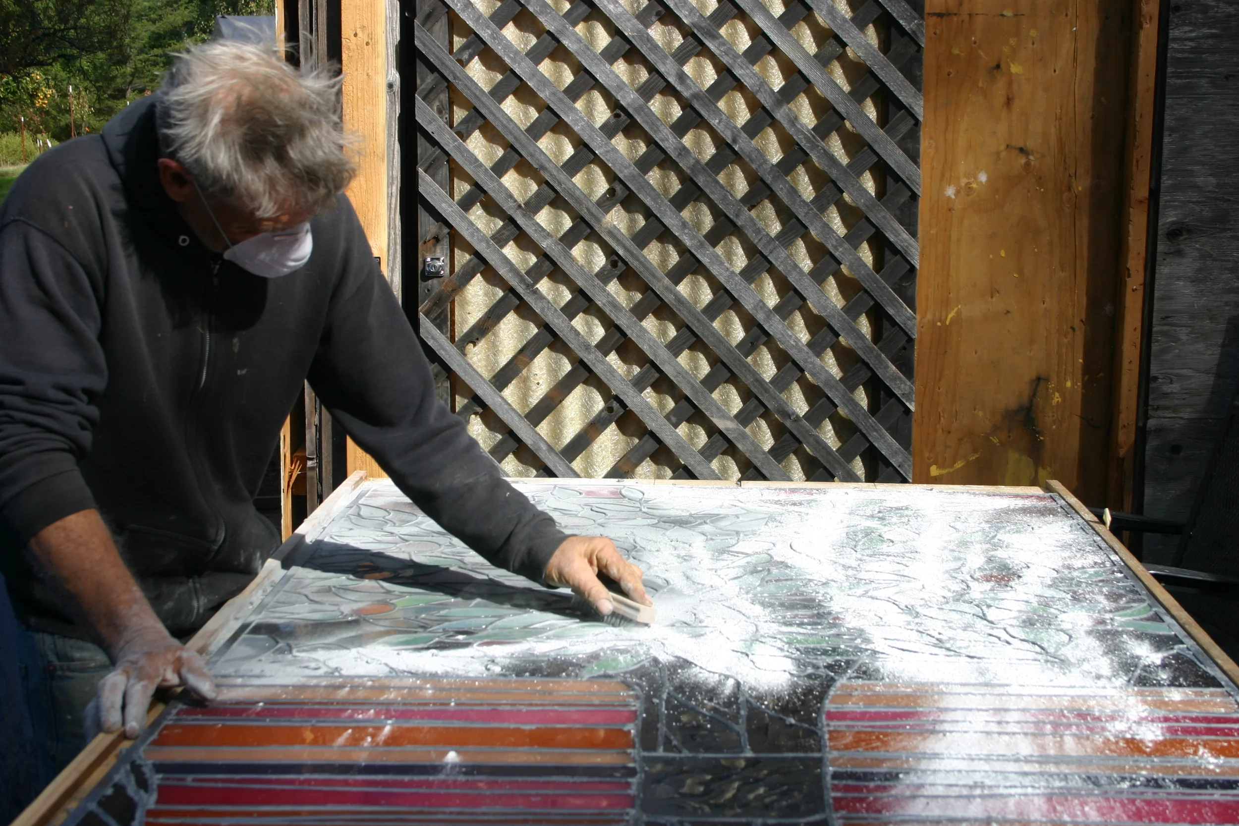  Cleaning up a panel with plaster of Paris. 