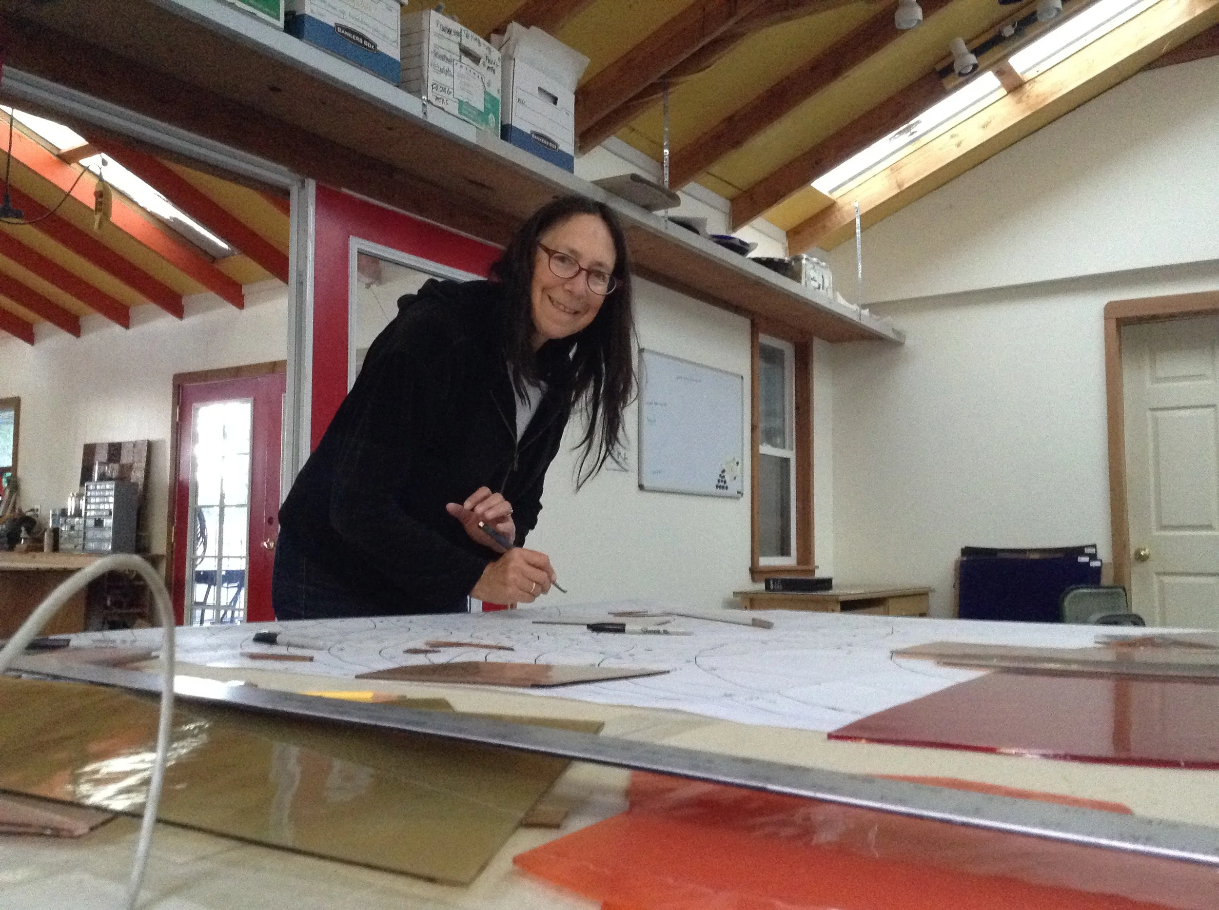  Michelle at the glass cutting table 