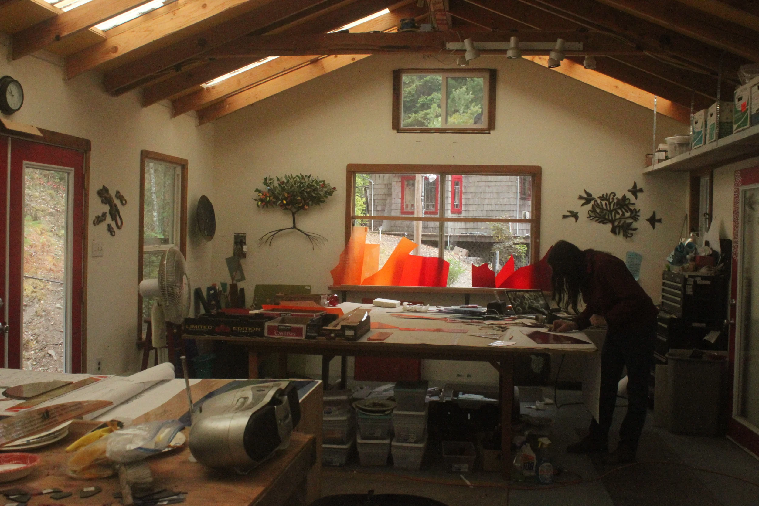  Michelle, hard at work, cutting glass. 