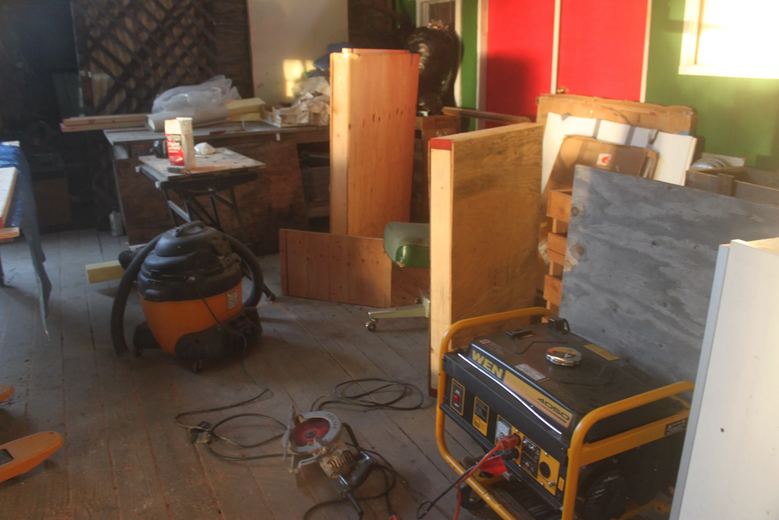  The two crated Holocaust Memorials stand amid the clutter of the continuing work on the Bima windows. 