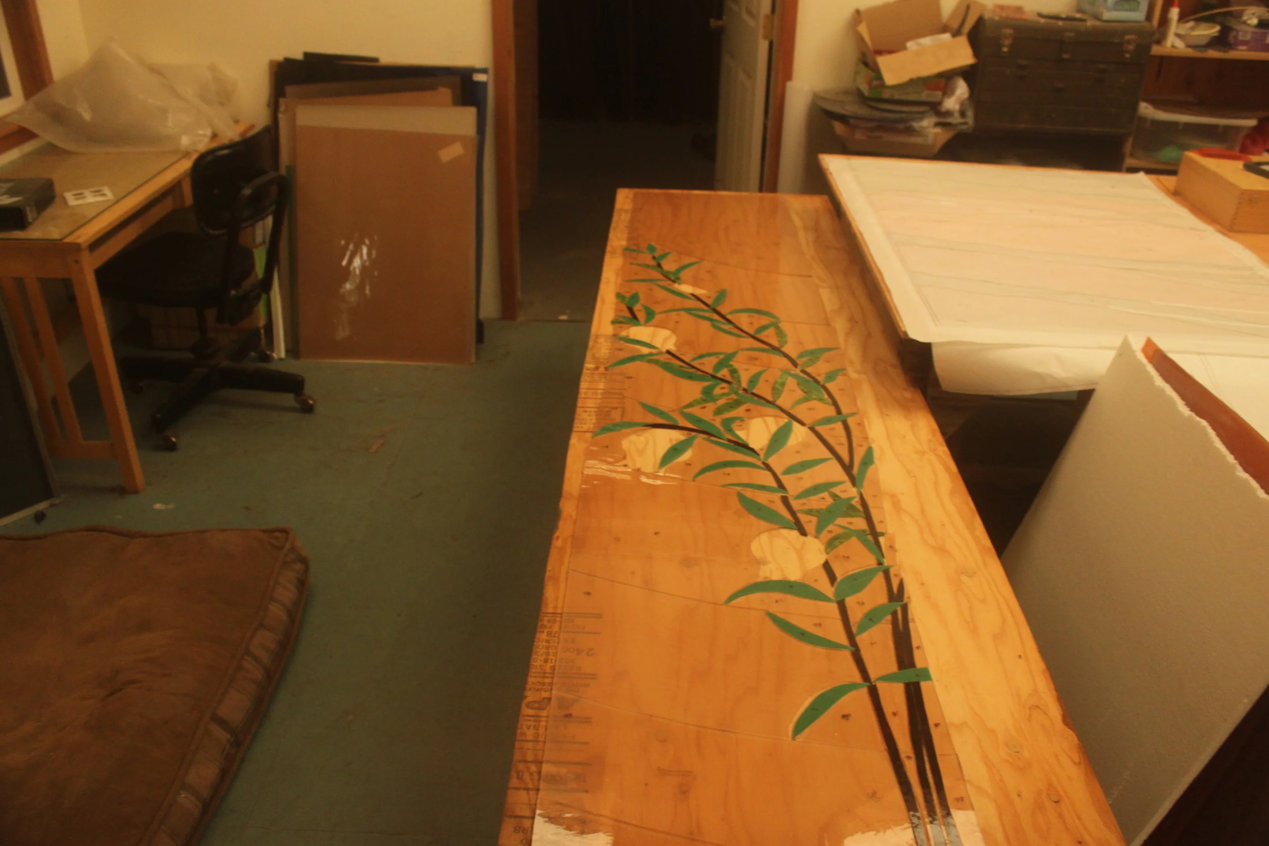  One completed ark door panel laid out on a work board. 