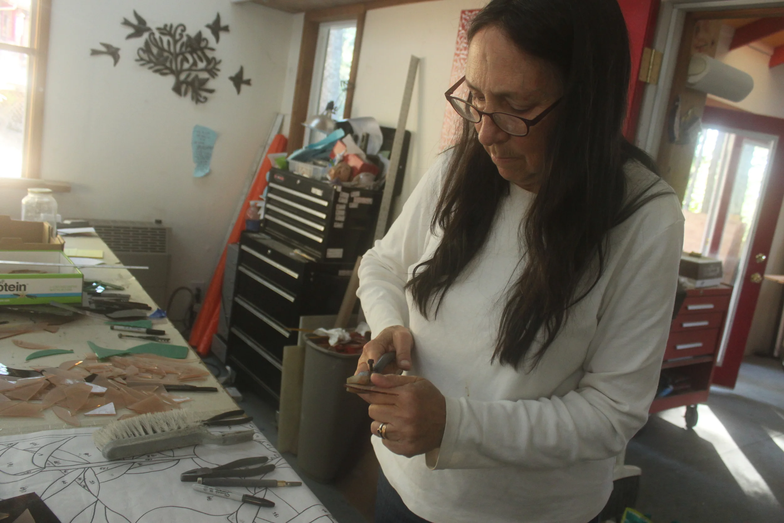  Michelle breaks out a small piece for one of the ark door panels. 