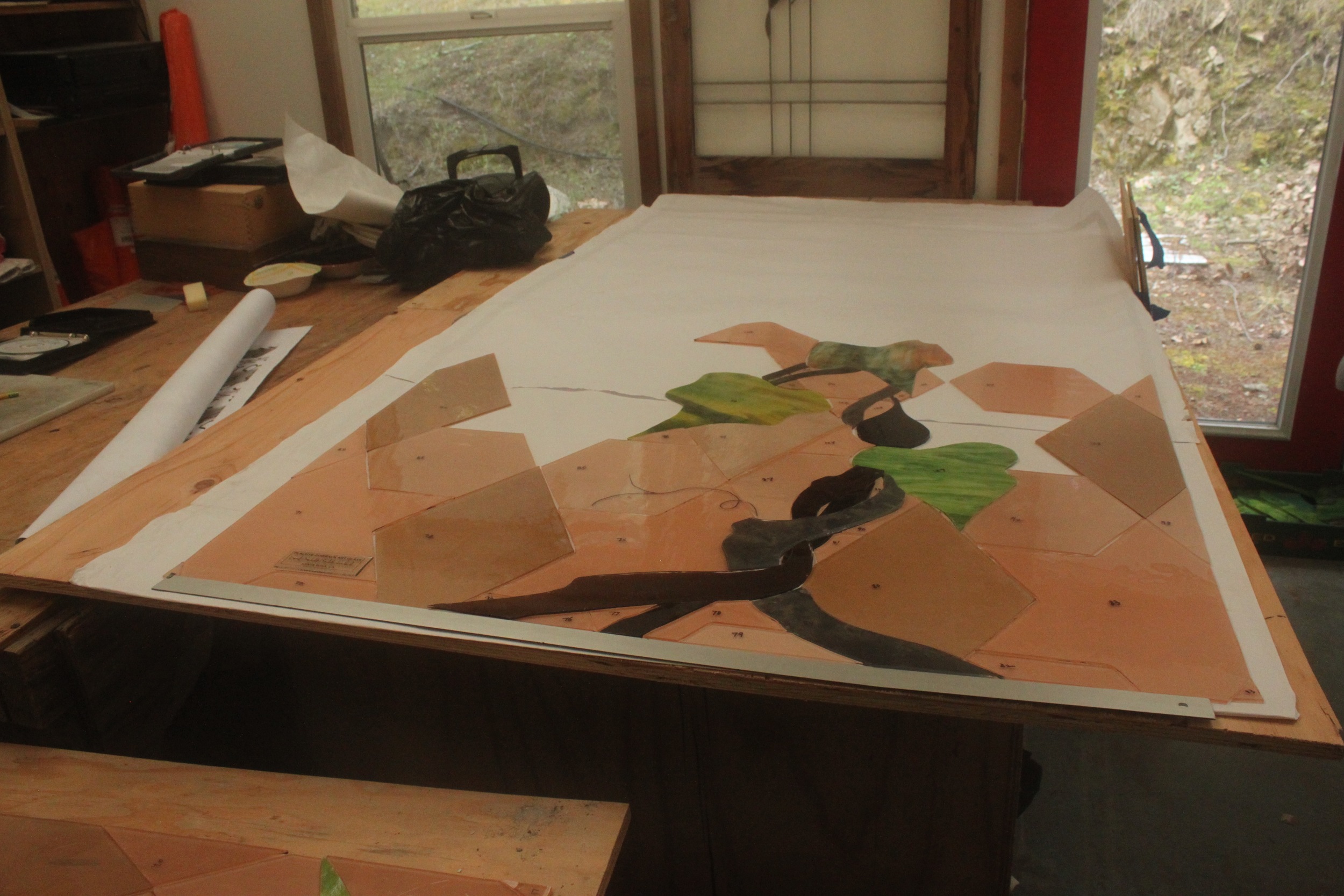 Progress on cutting the glass for the bottom panel on the grapevine side.