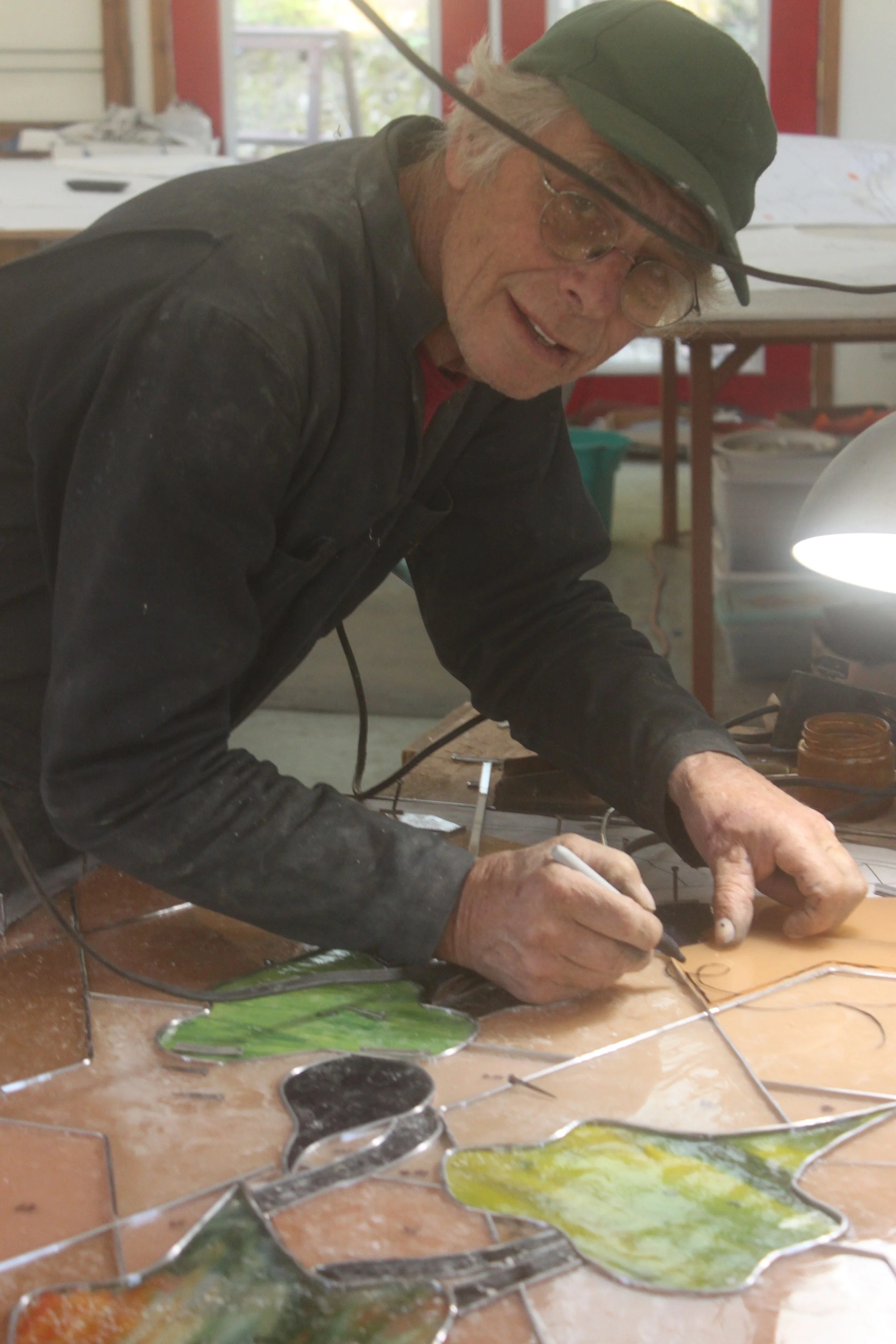 David works on the assembly of panel #5.