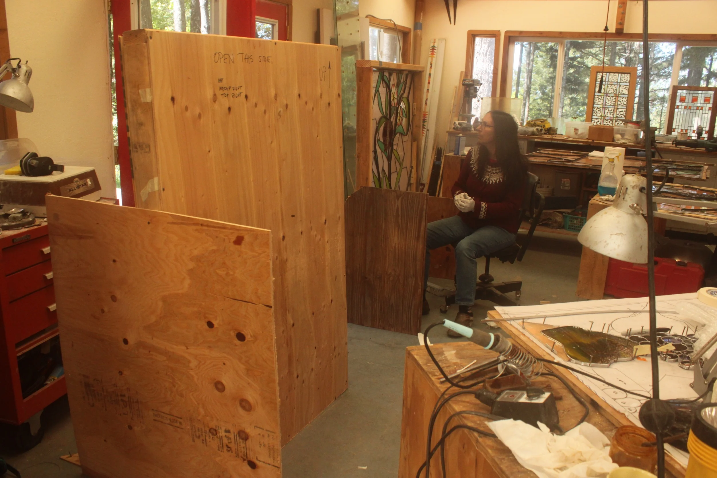 The windows are packed two to a box, after cleaning in preparation for delivery.
