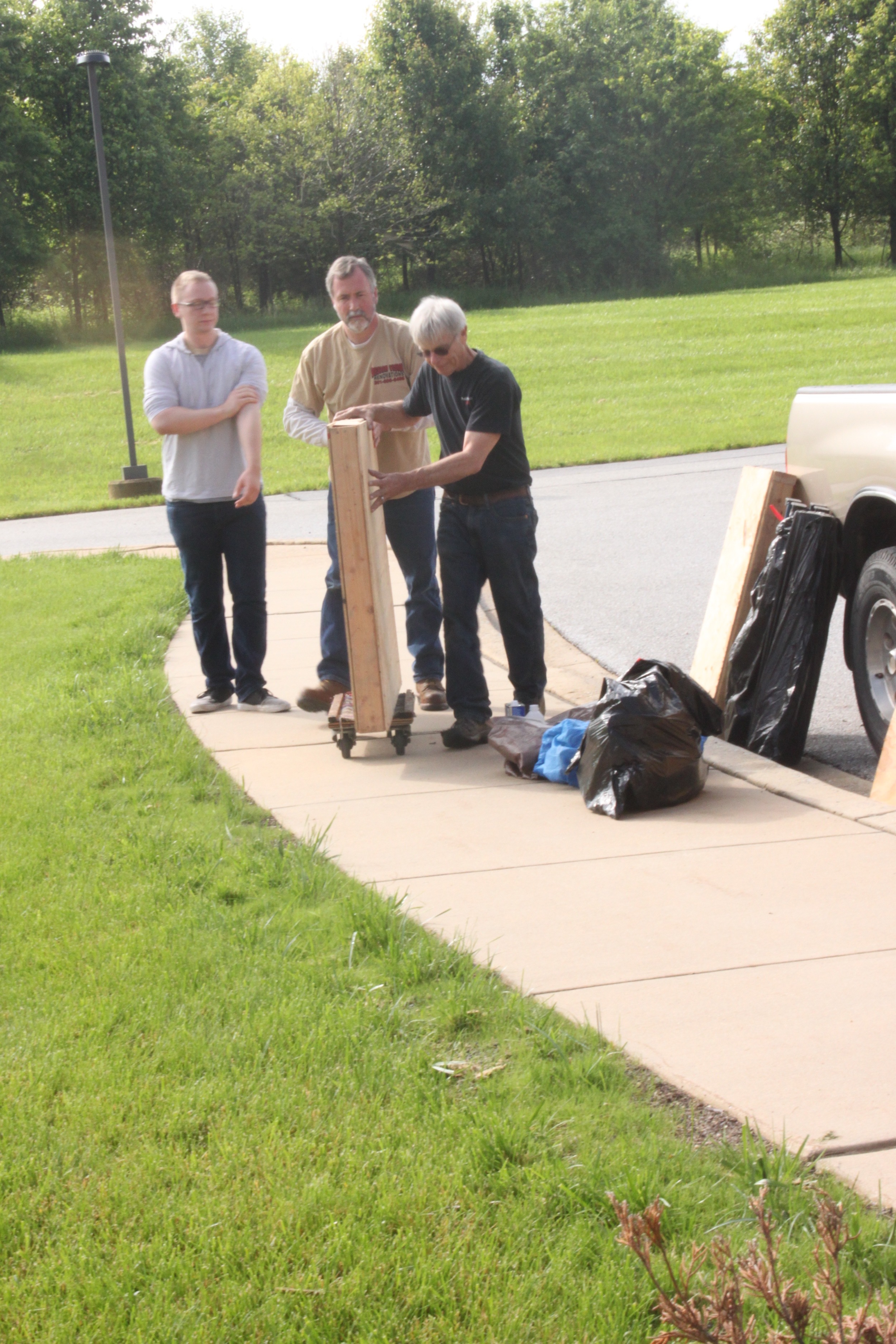 David, David and Carson roll the first crate of windows into the Temple.
