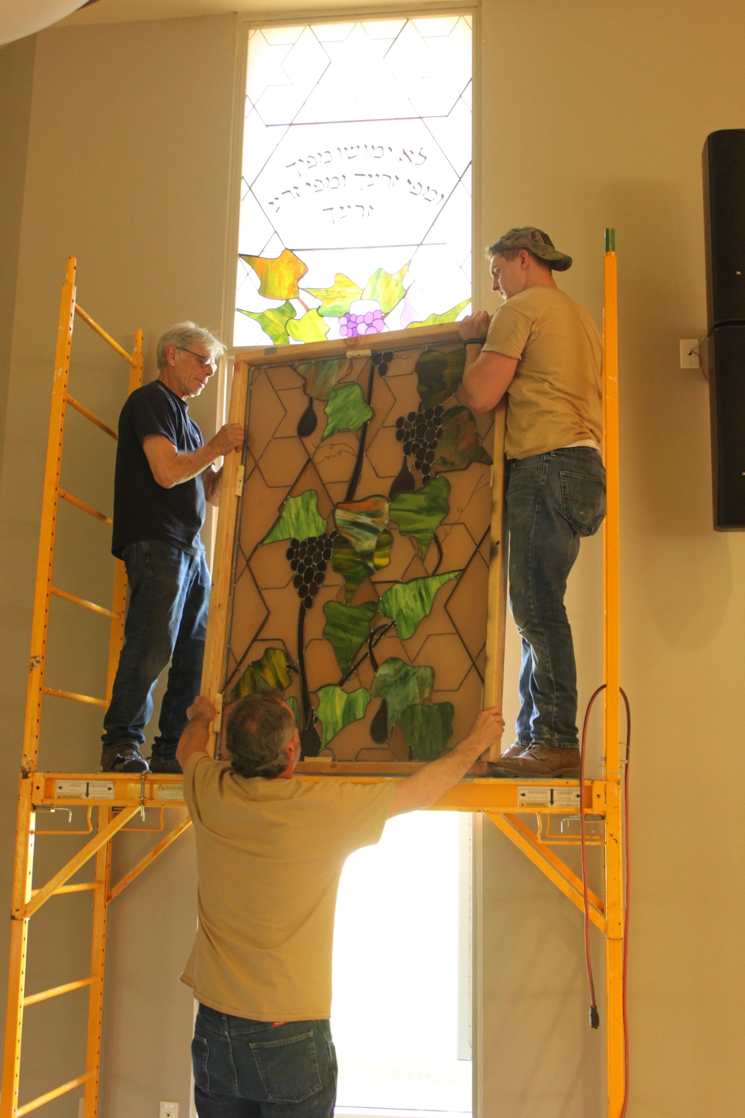 Staging the second panel to the top of the scaffold.