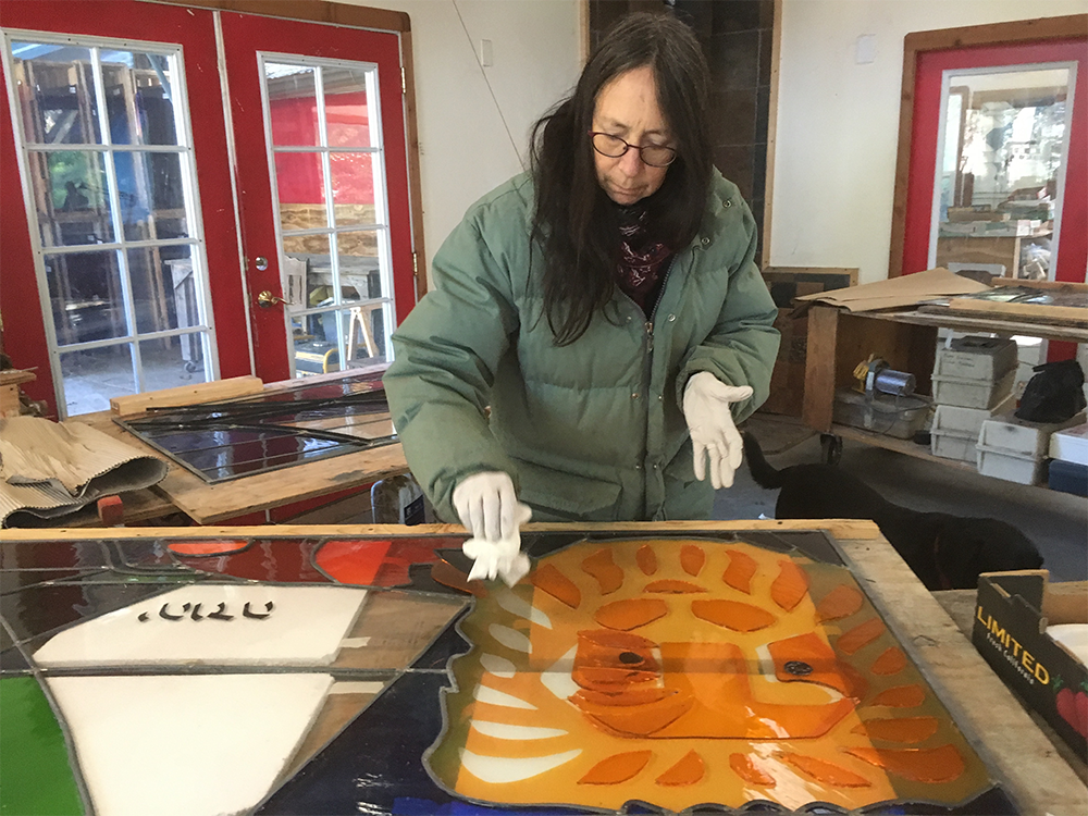 Michelle working on the Judah window in our Mendocino County studio.