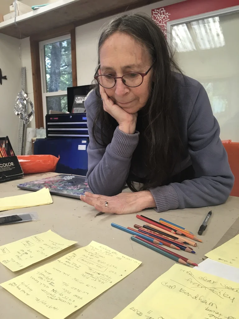 Michelle inventories the glass in preparation for placing the order to the distributor in New York.