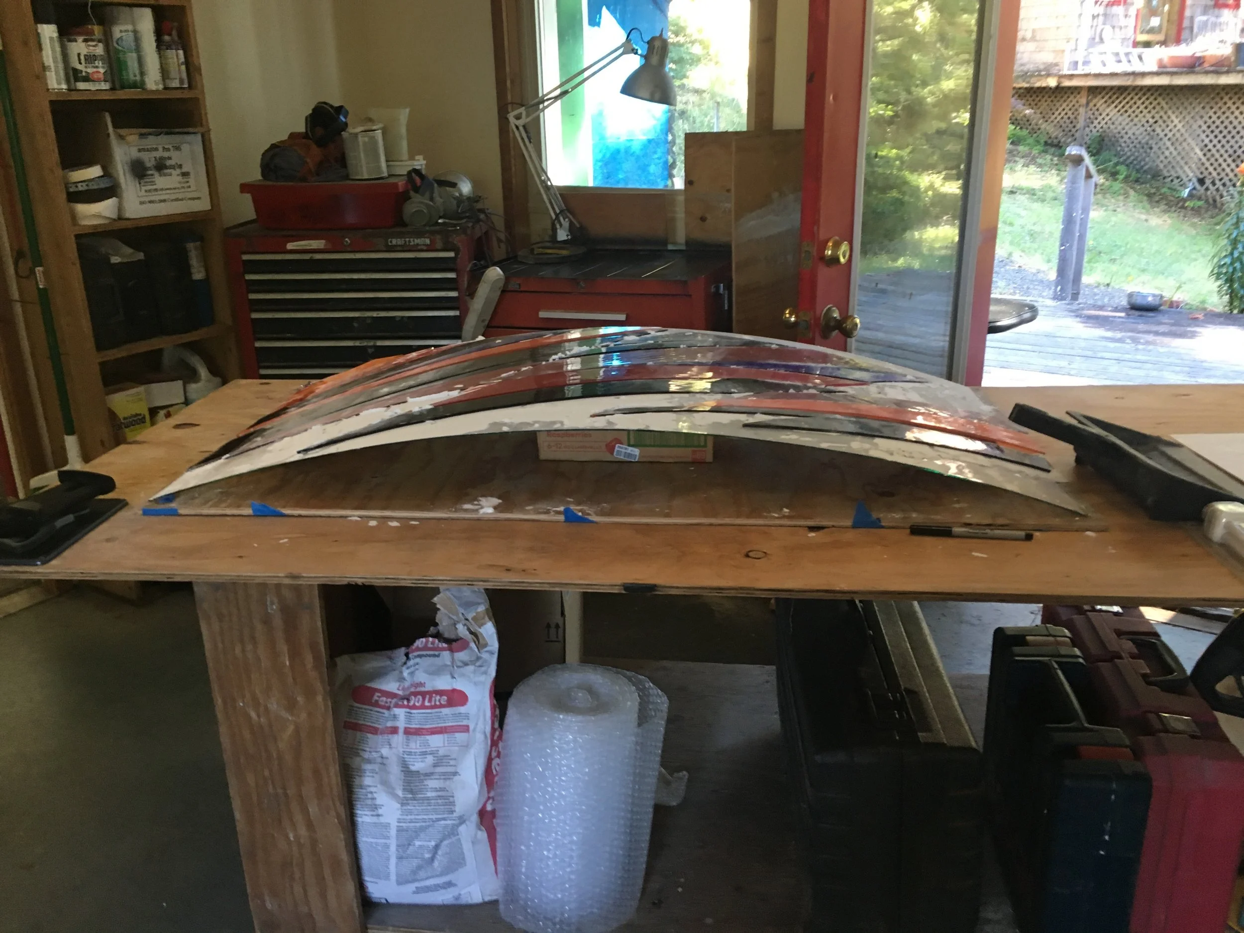  Pieces of one panel, returned from the kiln await assembly in the Sherwood Ranch studio. 