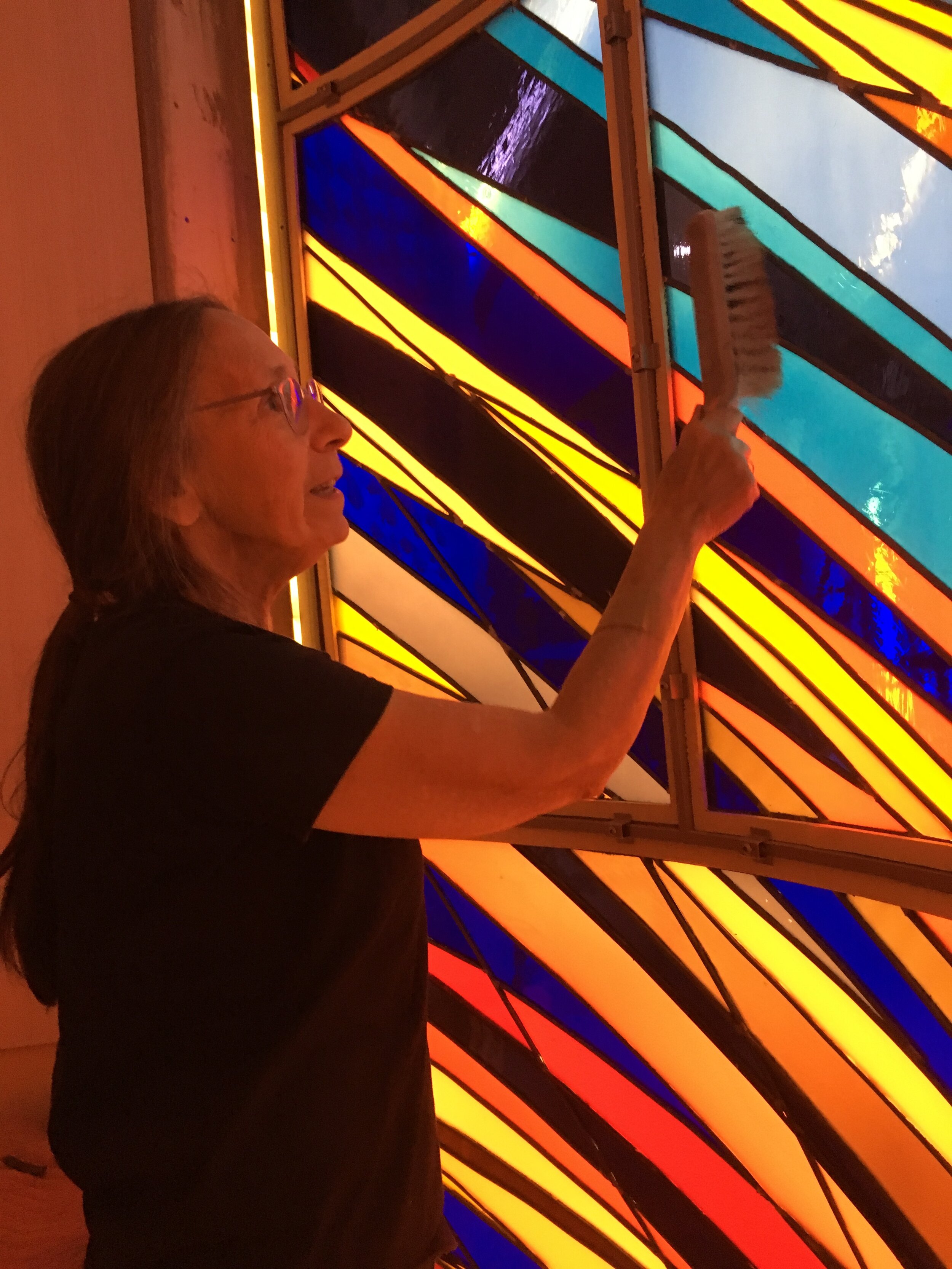  Michelle does final cleaning of the glass from the inside of the ark. 