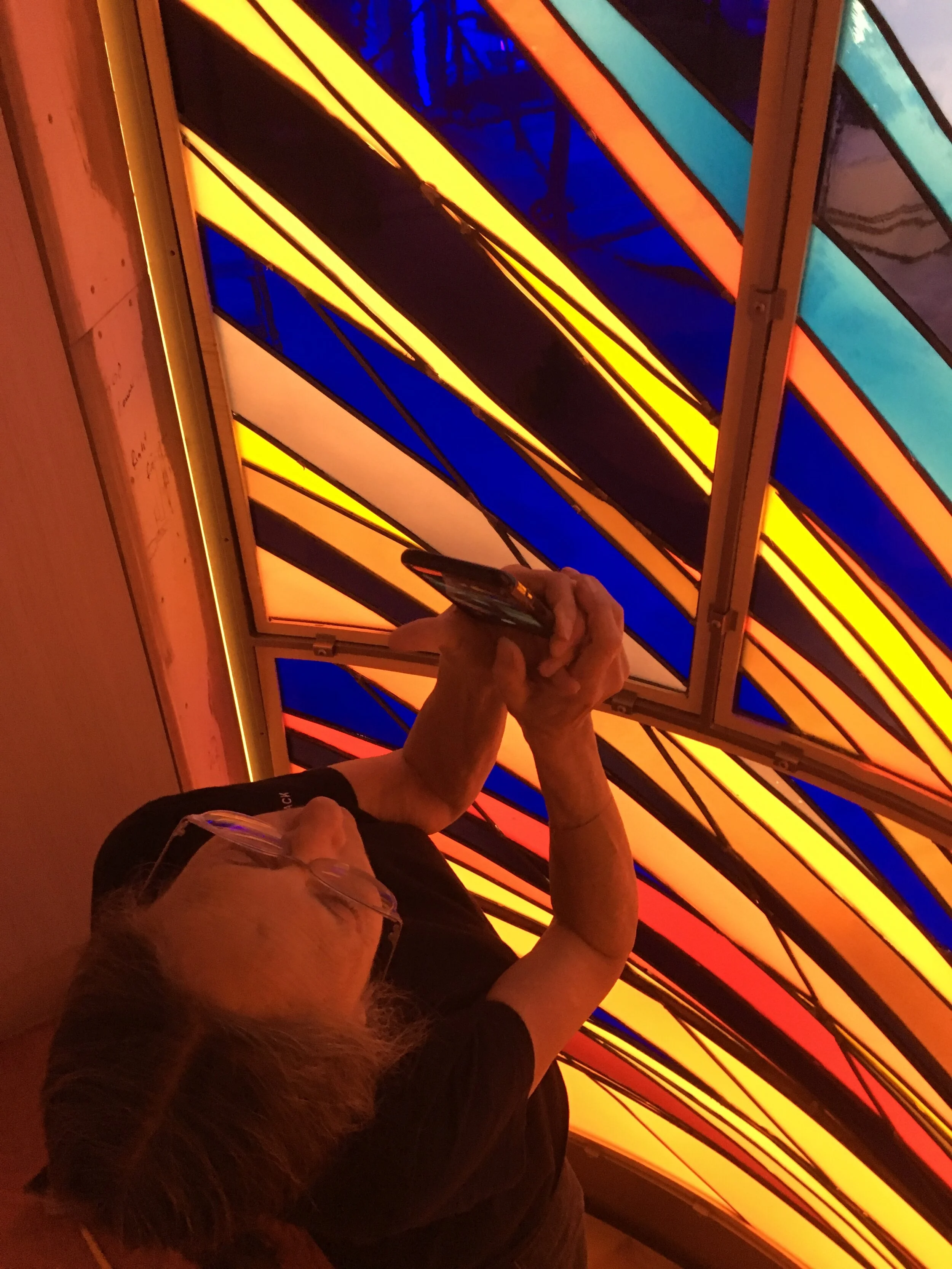  Michelle checks the upper panels. 