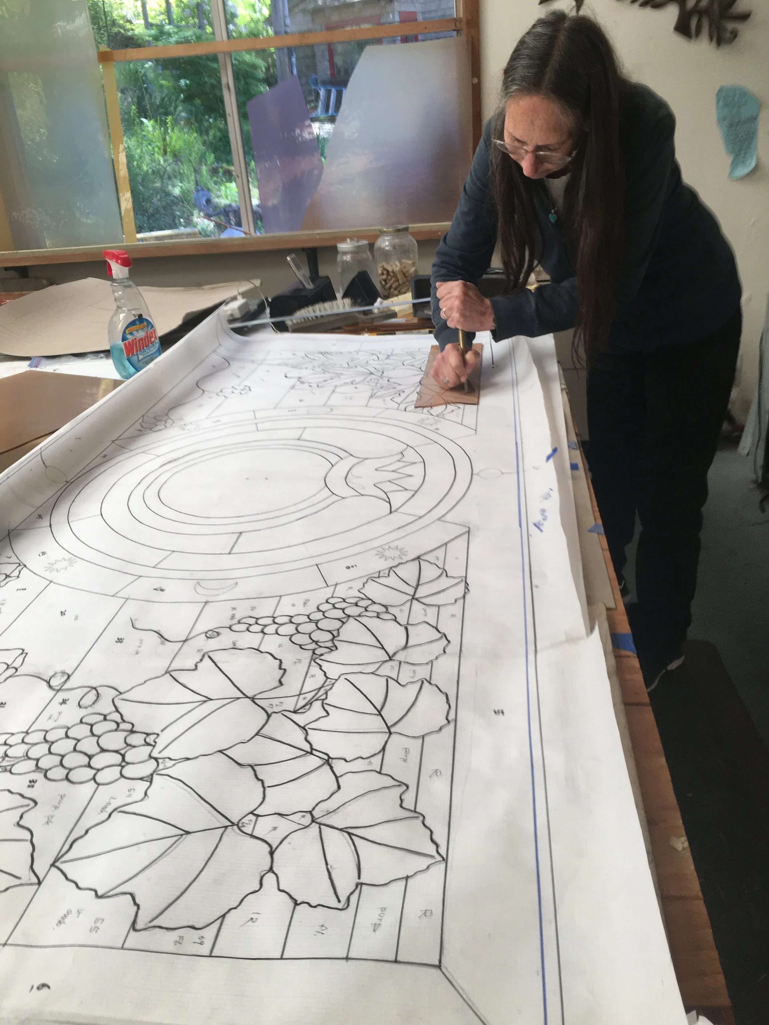  Michelle begins cutting the glass on the full size pattern.  April 27,2021 
