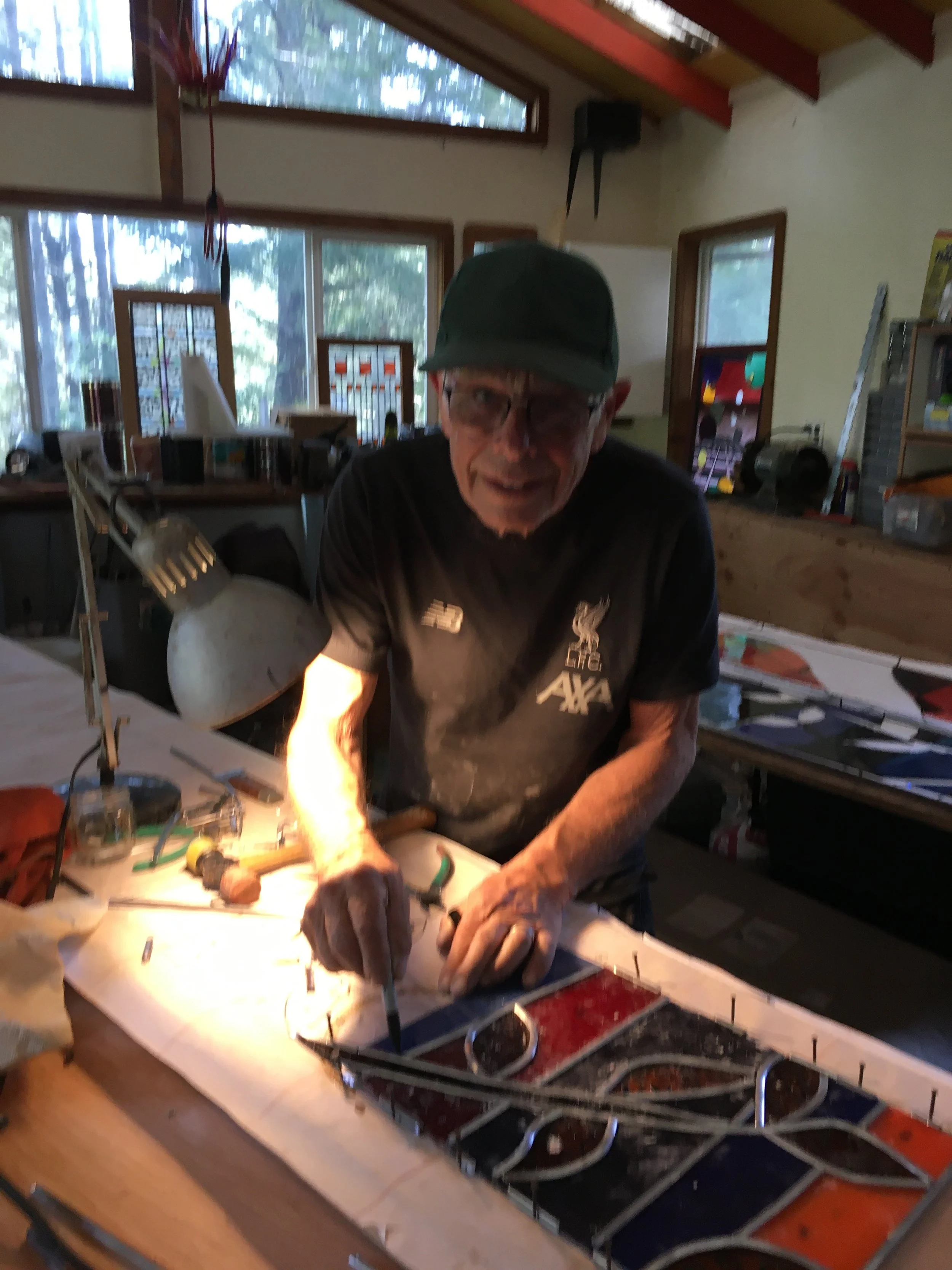  David is assembling a panel. 