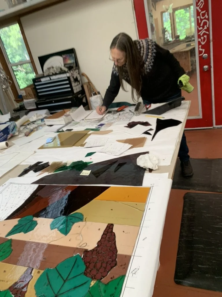  Michelle continues to cut glass for the center window group panels 