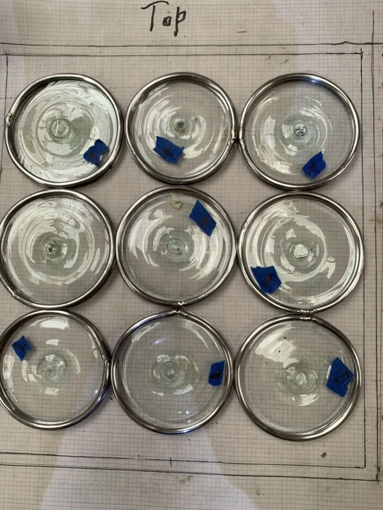  Nine clear rondels laid out three by three 