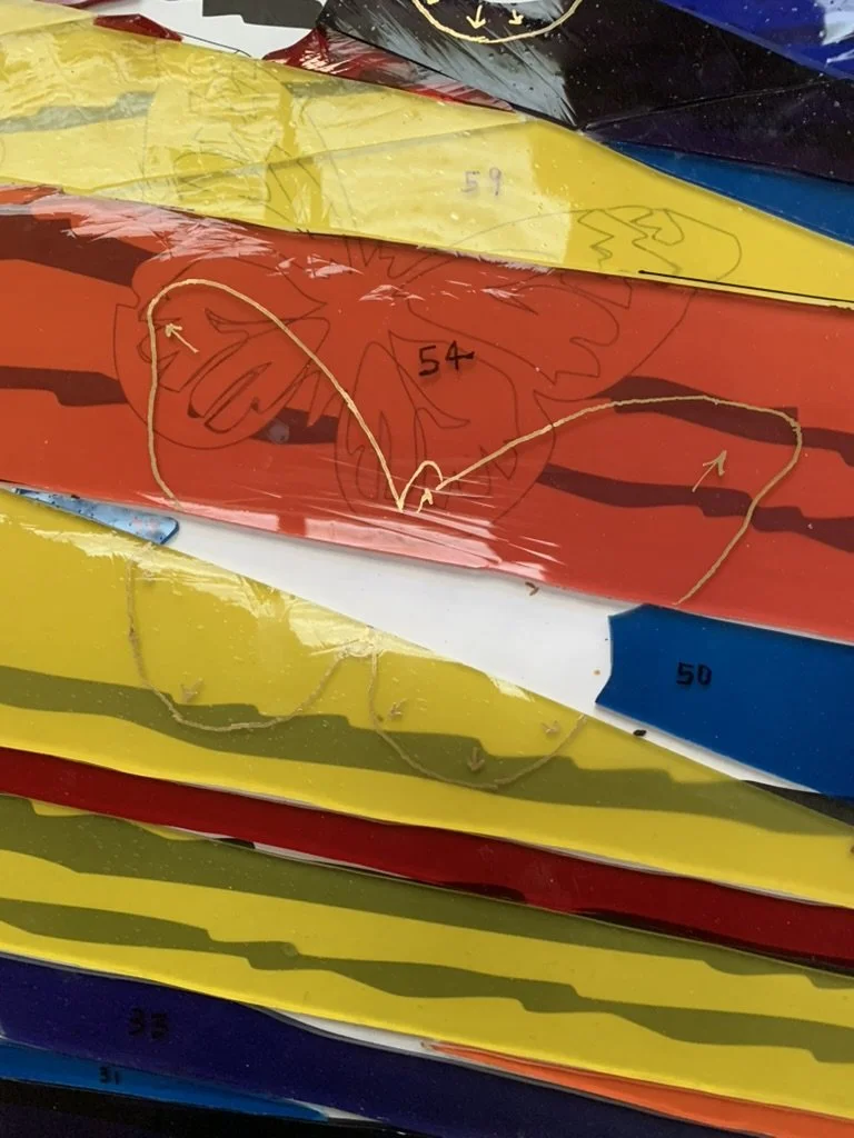  Background pieces are marked for saw cutting to fit 