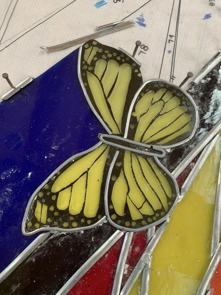  A butterfly leaded into place 