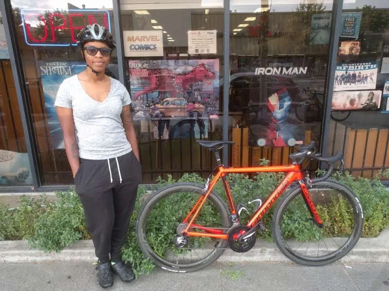 Me w/ my newly decked out and renamed bike "Bad and Boujee"