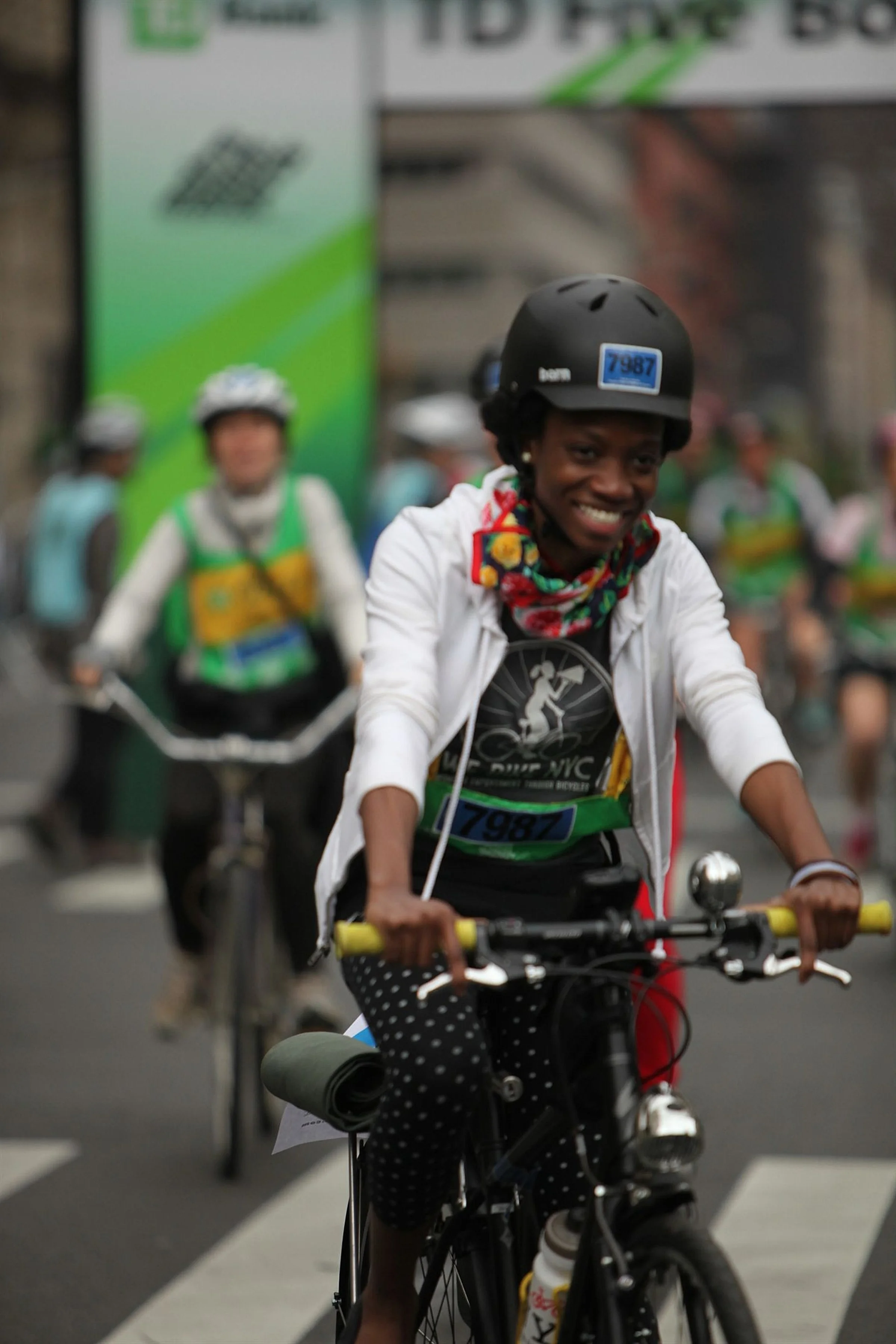 Photo by: Bike NY. Laura rides the “BFG” sporting a Silk Scarf and Polka dot Leggings at her first 5 Boro Bike Tour
