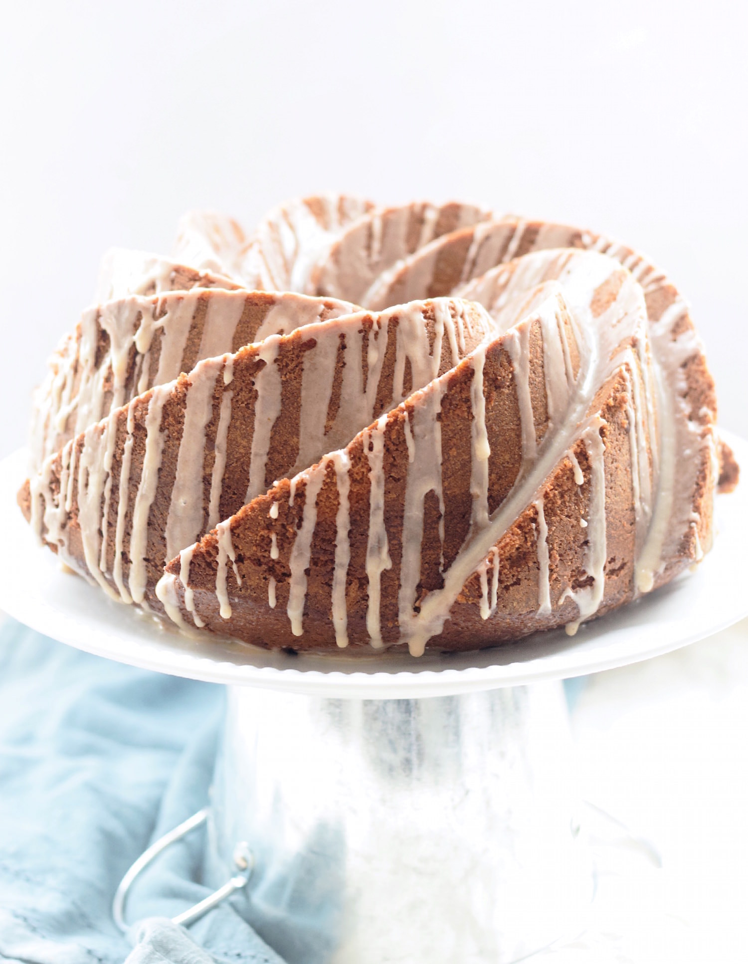 https://images.squarespace-cdn.com/content/v1/54a04011e4b0d1a214af85a9/1456694883313-U5IYDPCAZHOON4Z39OH5/Cinnamon+Swirl+Bundt+Cake%3A+one+bowl%2C+moist%2C+tender+vanilla+Bundt+cake+with+cinnamon+swirls.+Quick%2C+easy+and+completely+non-dairy%21+%7C+TrufflesandTrends.com
