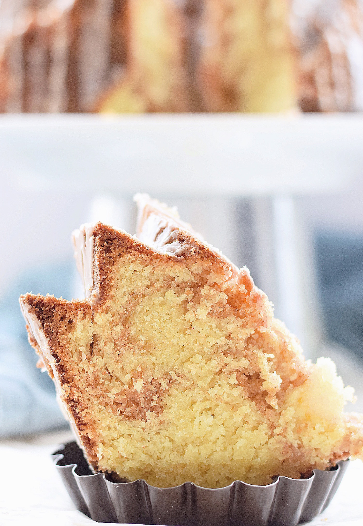https://images.squarespace-cdn.com/content/v1/54a04011e4b0d1a214af85a9/1456695252281-FFLYK2TC9P8Y254WEB4P/Cinnamon+Swirl+Bundt+Cake%3A+one+bowl%2C+moist%2C+tender+vanilla+Bundt+cake+with+cinnamon+swirls.+Quick%2C+easy+and+completely+non-dairy%21+%7C+TrufflesandTrends.com