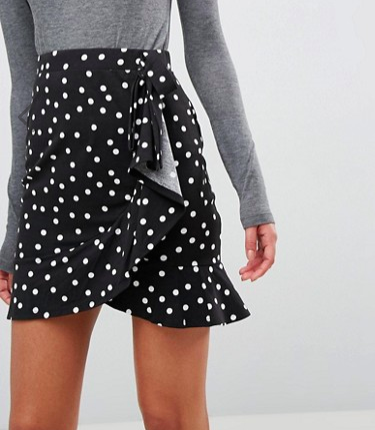 ASOS DESIGN mini wrap skirt in polka dot print