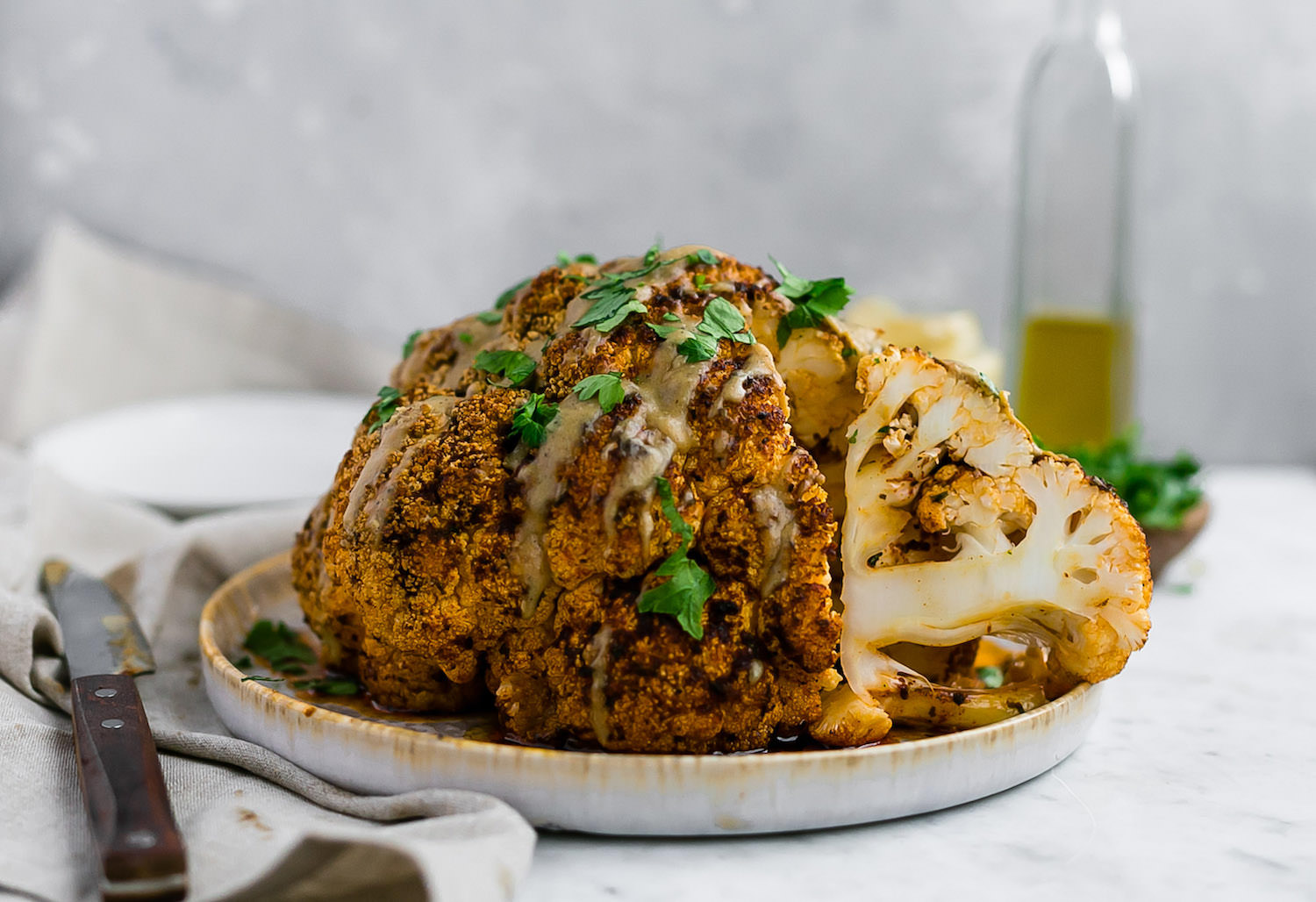 Whole Roasted Cauliflower with Tahini Sauce Truffles and Trends