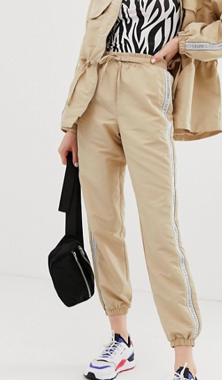Monki two-piece sweatpants with slogan panel in beige