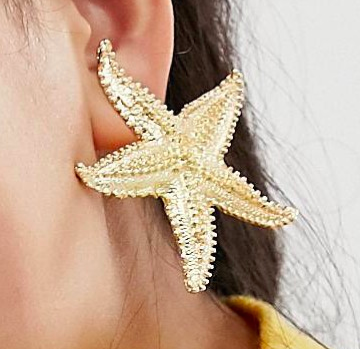 ASOS DESIGN earrings in statement starfish design in gold