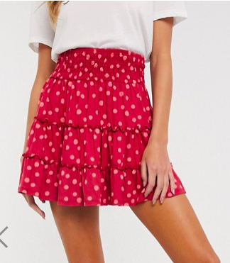 ASOS DESIGN tiered mini skirt in pink polka dot