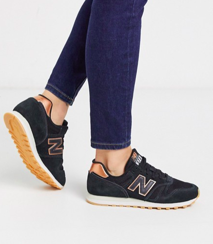 New Balance 373 sneakers in black and rose gold