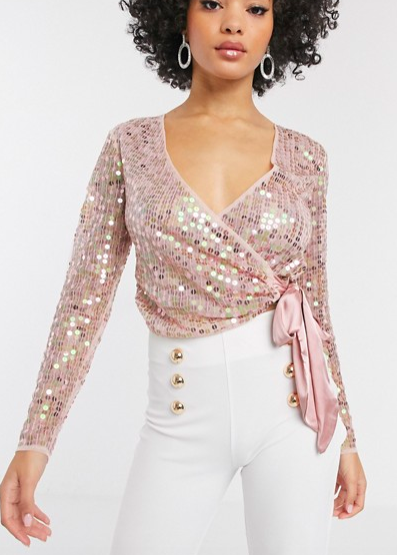 ASOS DESIGN sequin wrap top with bow in pink