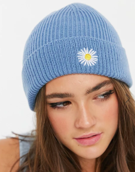 ASOS DESIGN fisherman rib beanie with daisy embroidery in blue