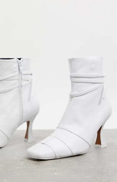 ASOS DESIGN Ryder premium leather boots with interest heel in white