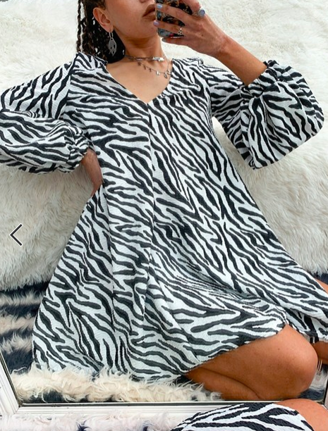 ASOS DESIGN textured mini v-neck swing dress in zebra print