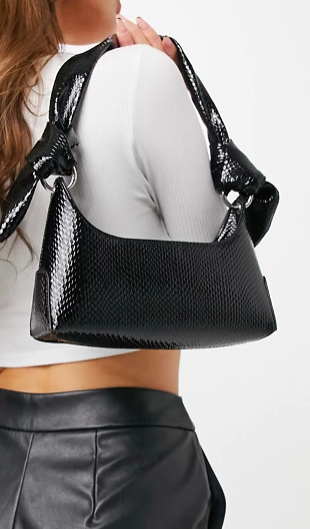 ASOS DESIGN shoulder bag with knot strap in black shiny snake