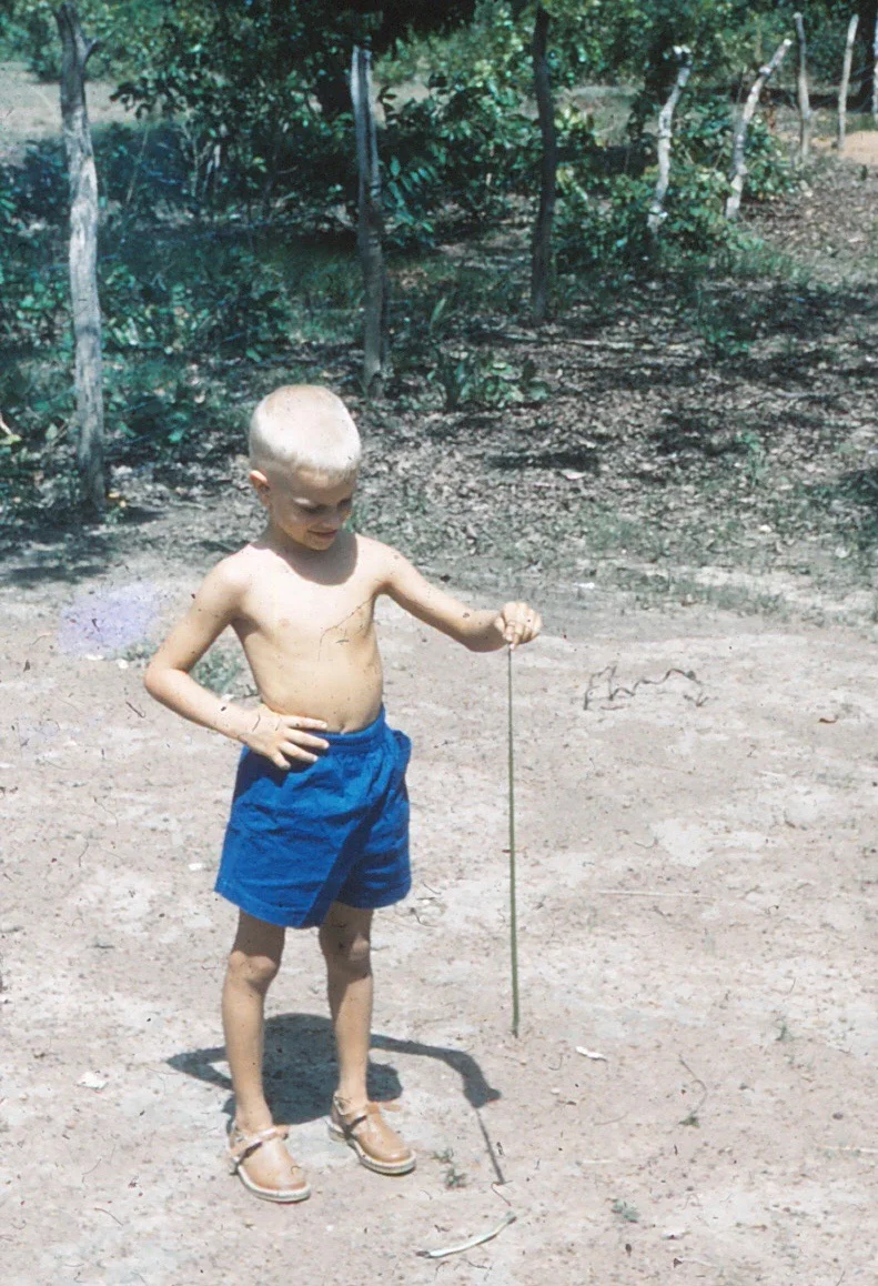 Richie and a little snake, just before leaving for the boarding school