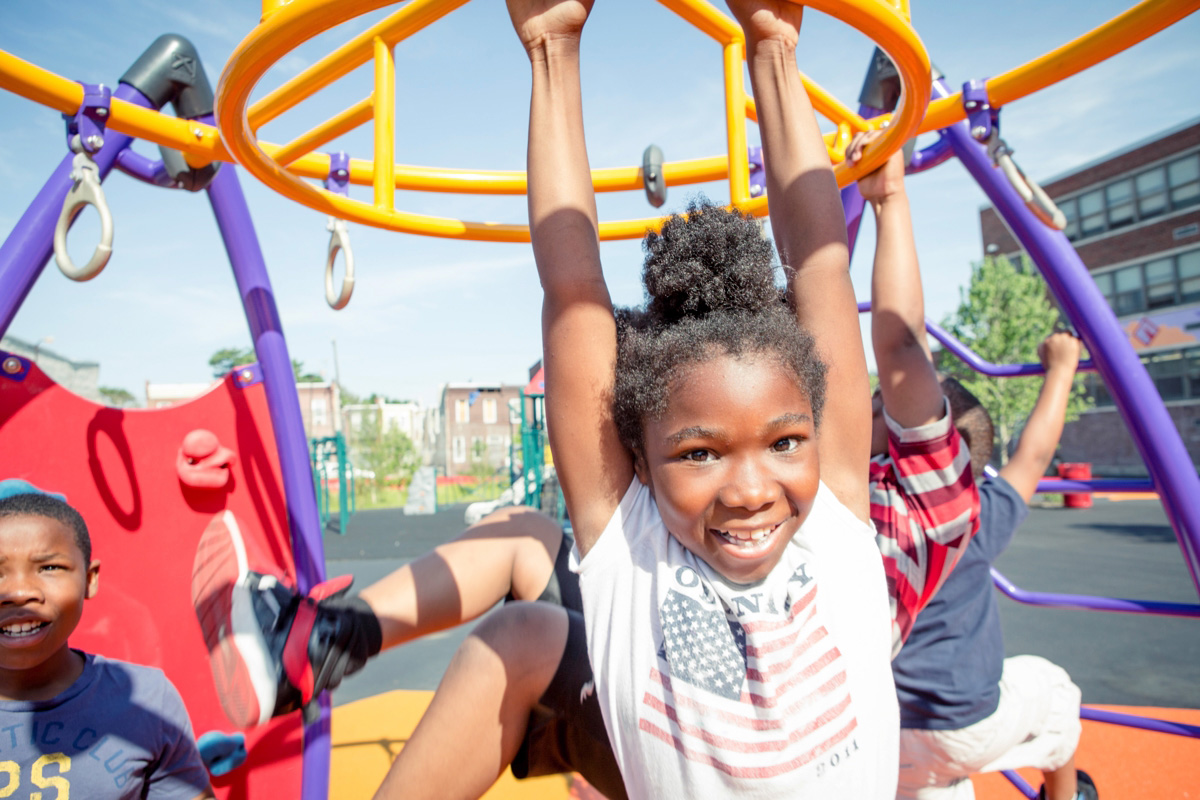 William Dick School students enjoy new play equipment.