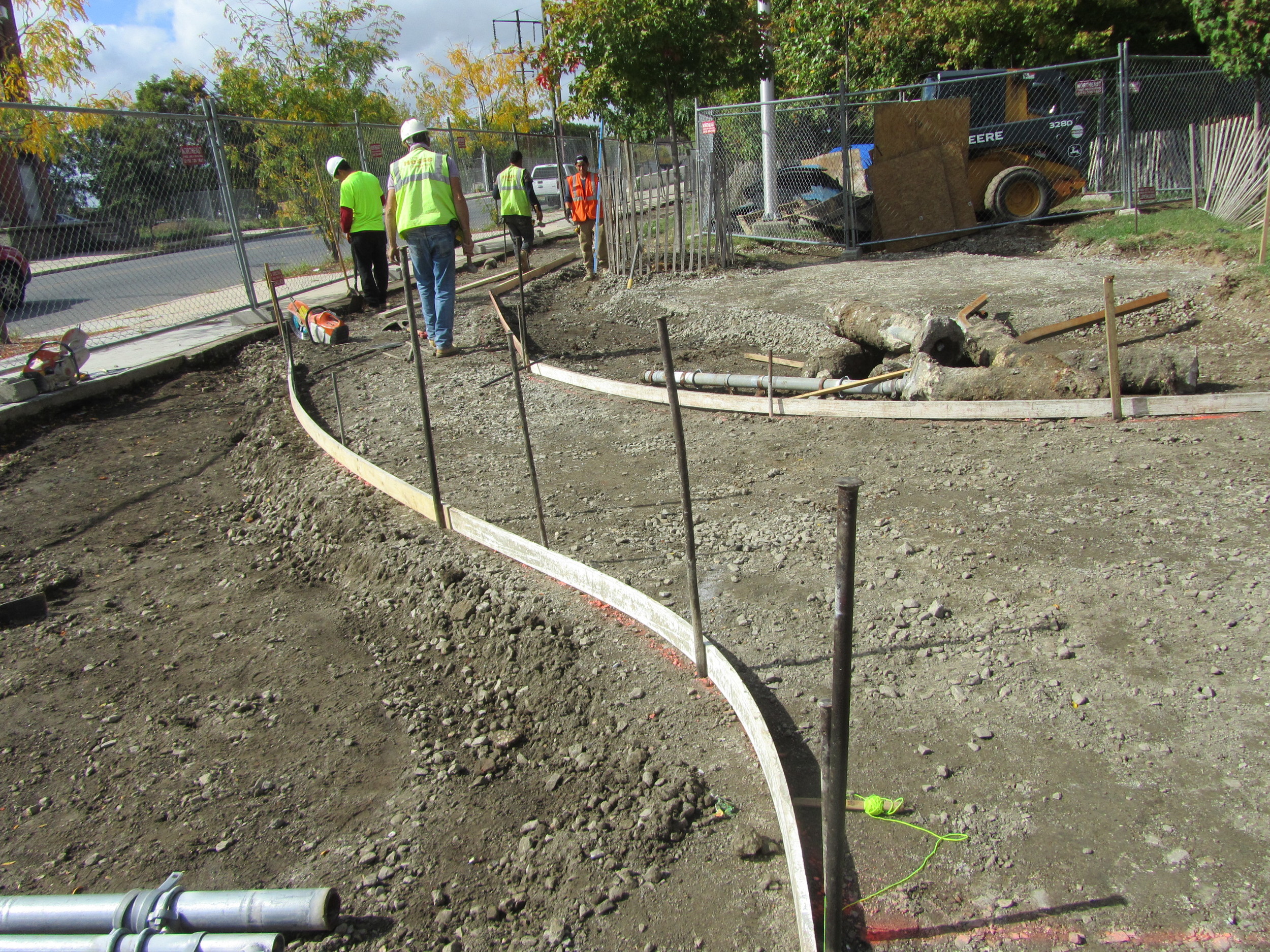 Form work is placed for new concrete walks.