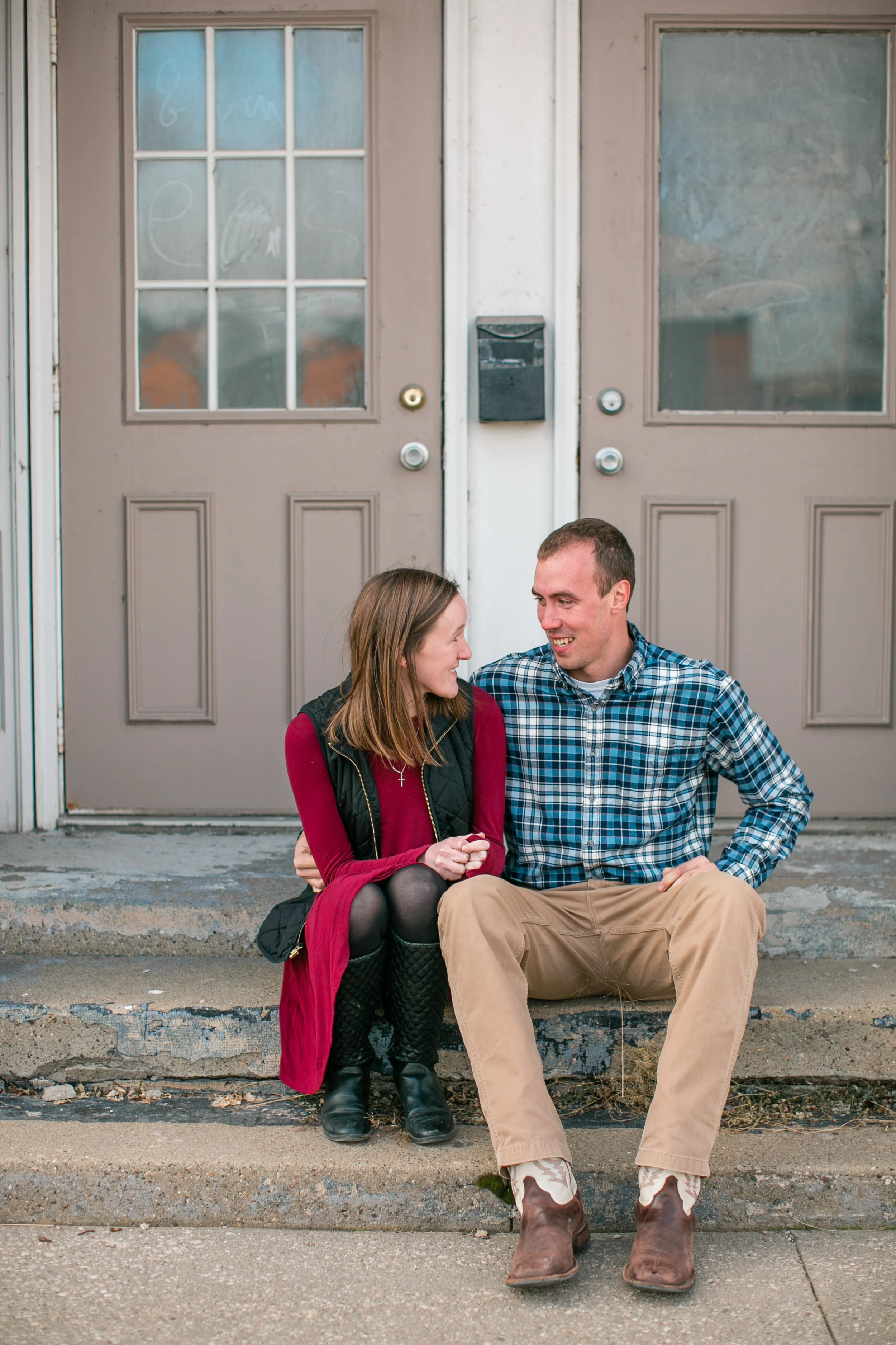 cute couple taking winter engagement photos