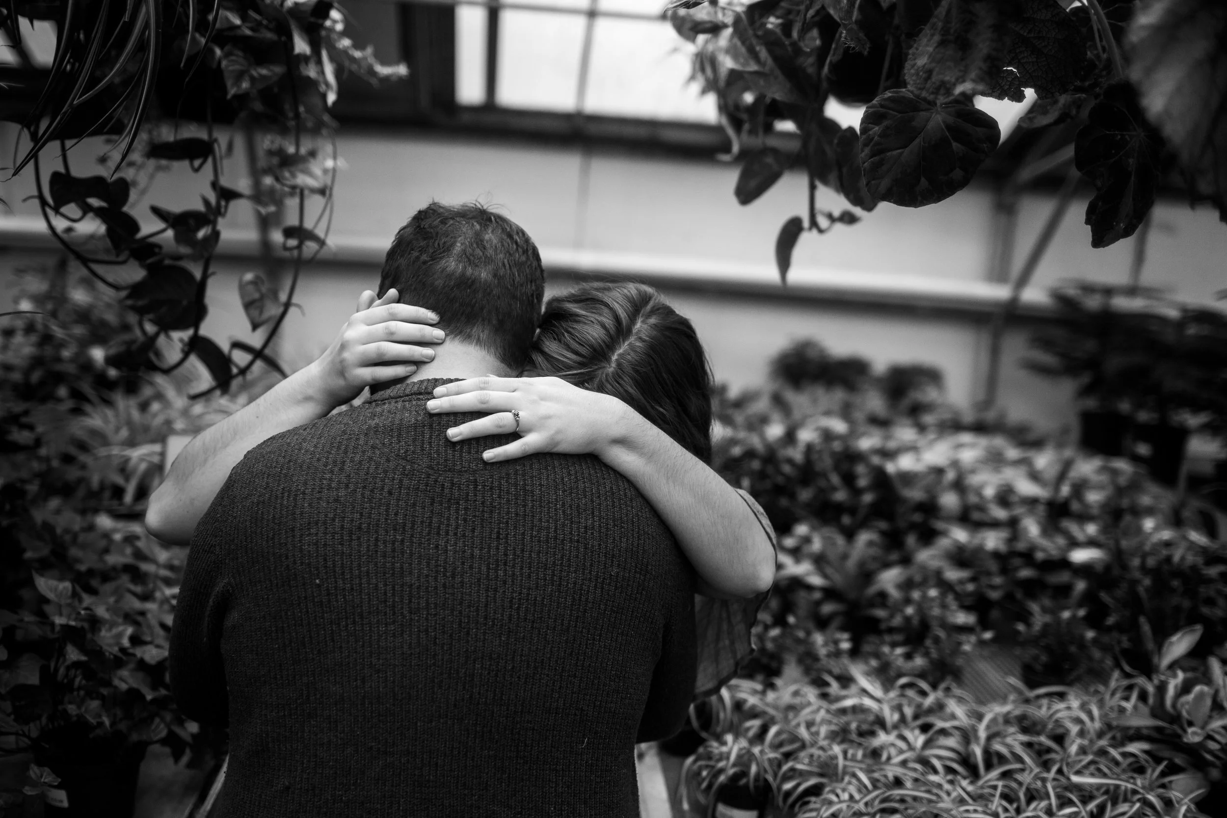 moody greenhouse engagement photos