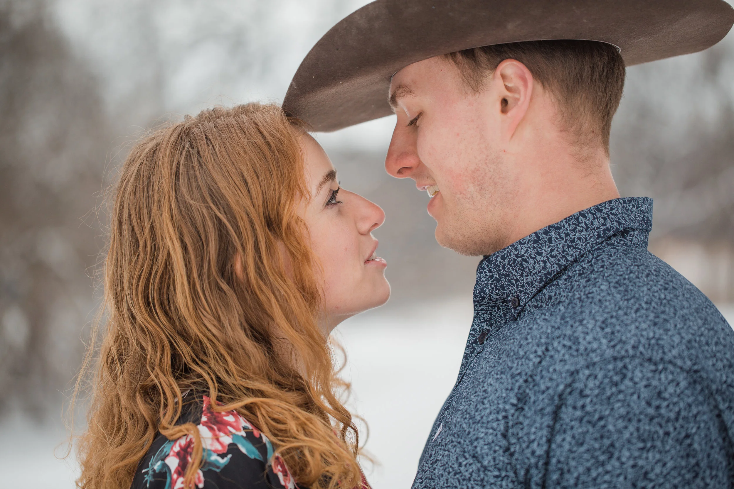 ariat cowboy hat winter engagement photos