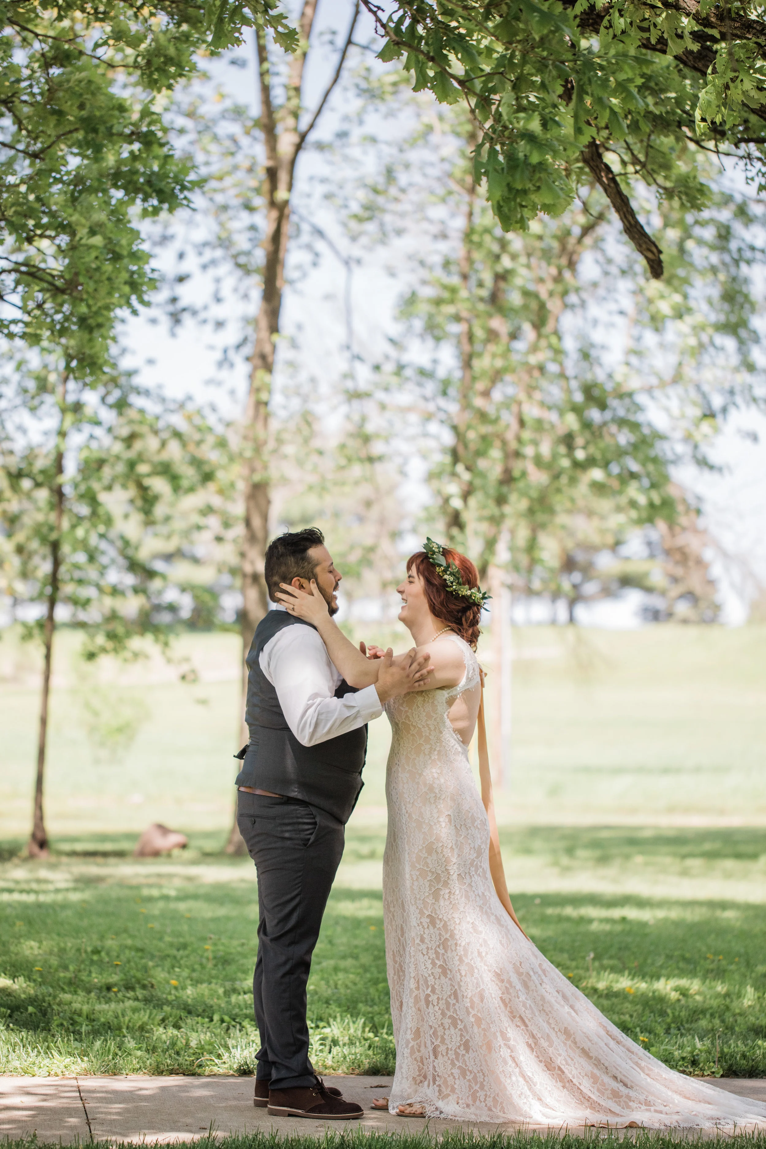 romantic and emotional first look moments outside Riverside bible camp in Story City wedding