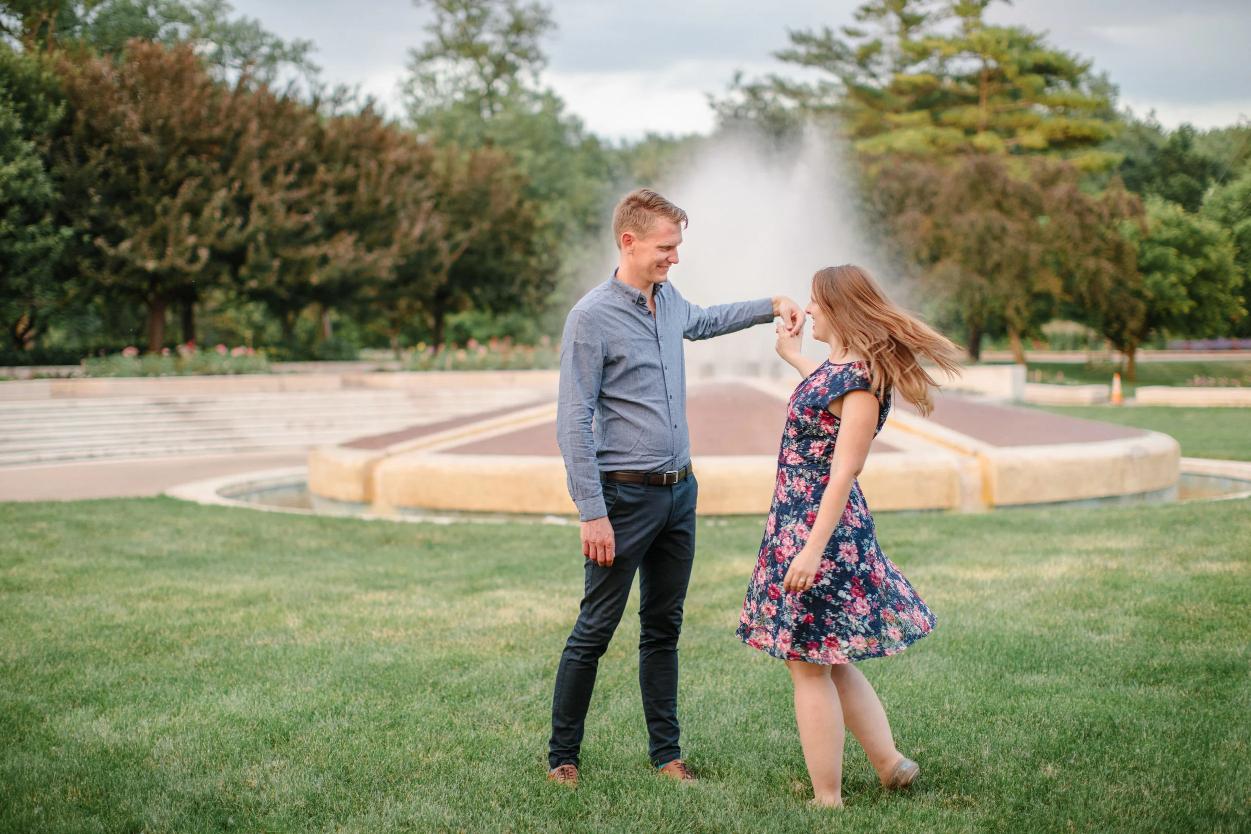 twirling during photos in park in summer