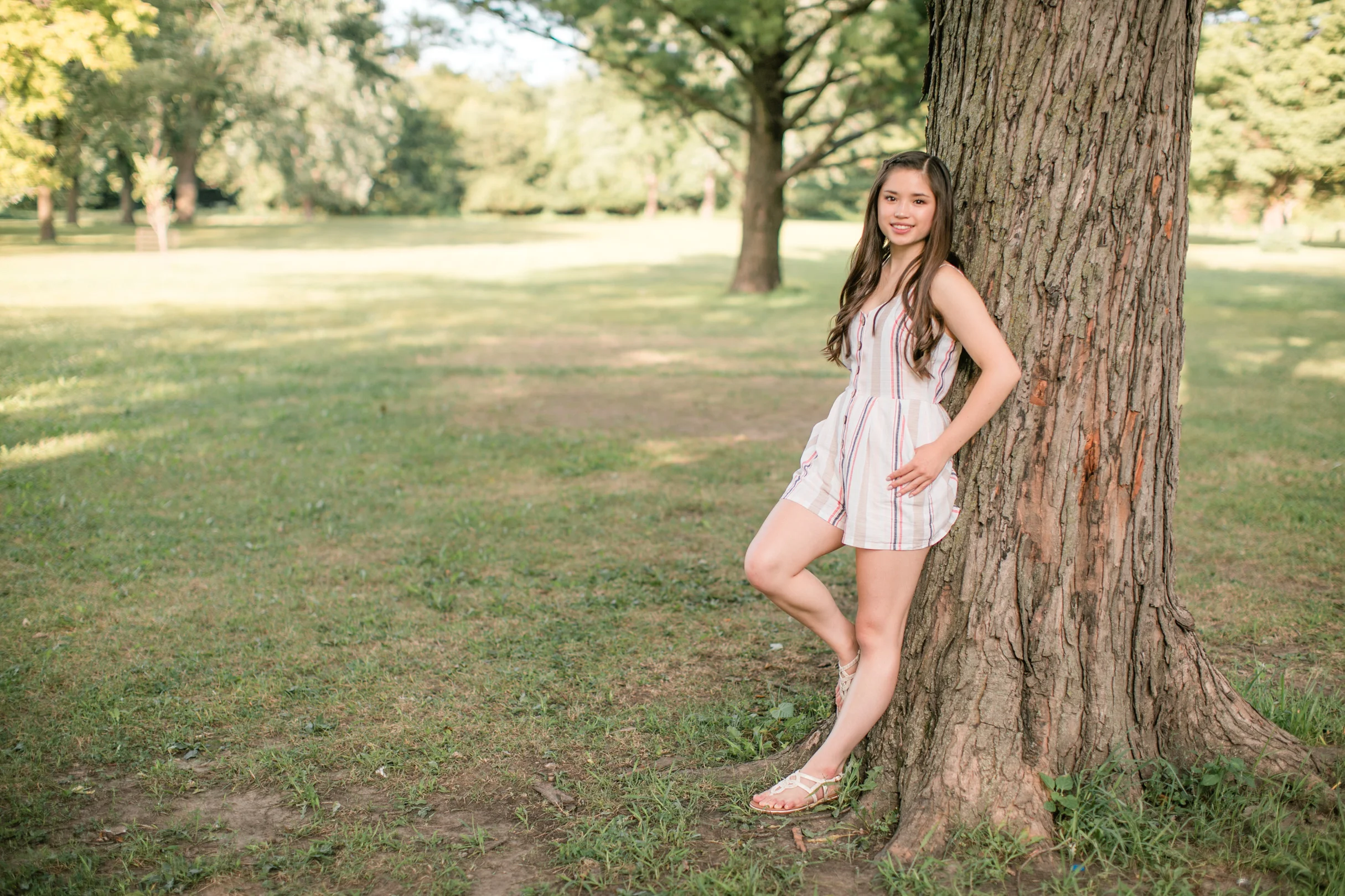 waukee dance team senior photos in park outdoors